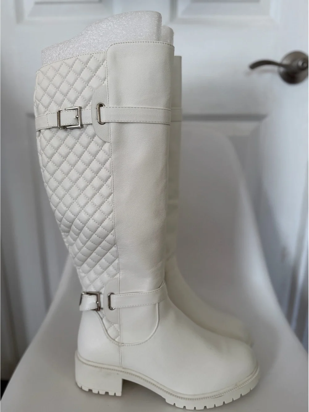 White quilted knee high boots